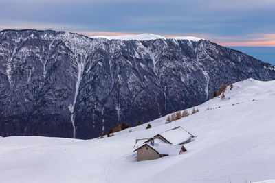 Panoramic view of snowcapped mountains against sky