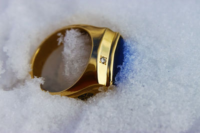 Close-up of ring in snow