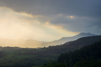 Scenic view of mountains against sky during sunset