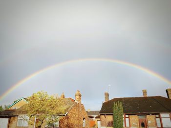 Low angle view of rainbow against sky