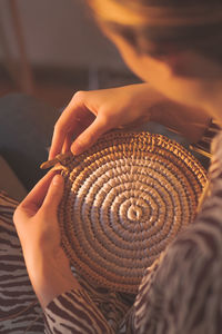 High angle view of woman making artwork