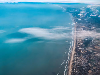 Aerial view of sea against sky