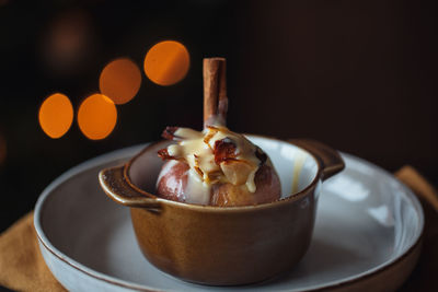 Close-up of baked apple on plate