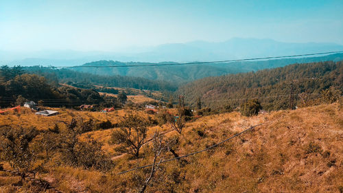 Scenic view of landscape against sky during autumn