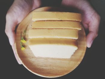 Close-up of hand holding ice cream
