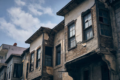 Low angle view of old building against sky