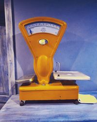 Close-up of yellow toy on table