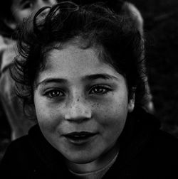 Close-up portrait of smiling girl