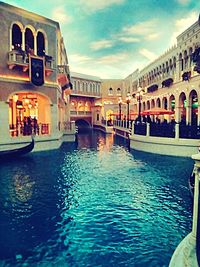 View of canal along buildings