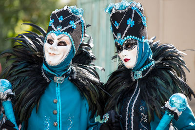 People wearing mask during festival