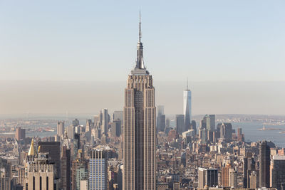 Modern buildings in city against sky