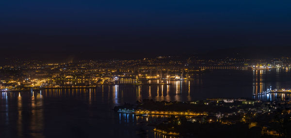 Illuminated cityscape at night