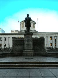 Low angle view of statue against the sky