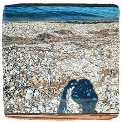 Silhouette of person standing on beach