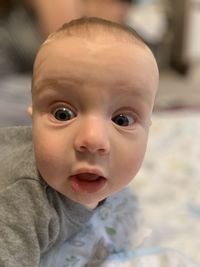 Portrait of cute baby boy at home