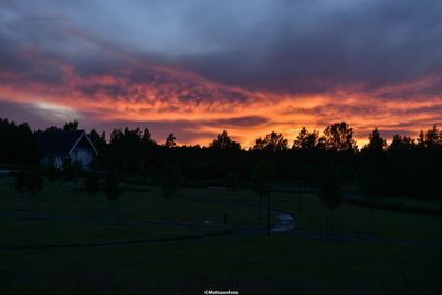 Scenic view of field against sky during sunset