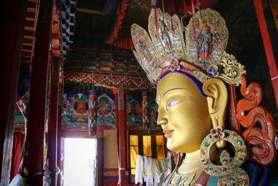 Low angle view of statue against building