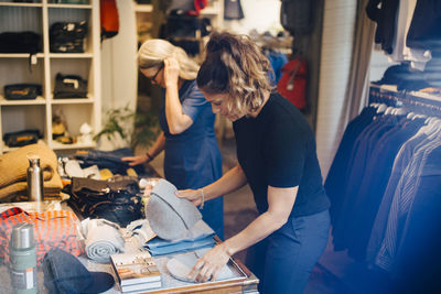 Women standing at store