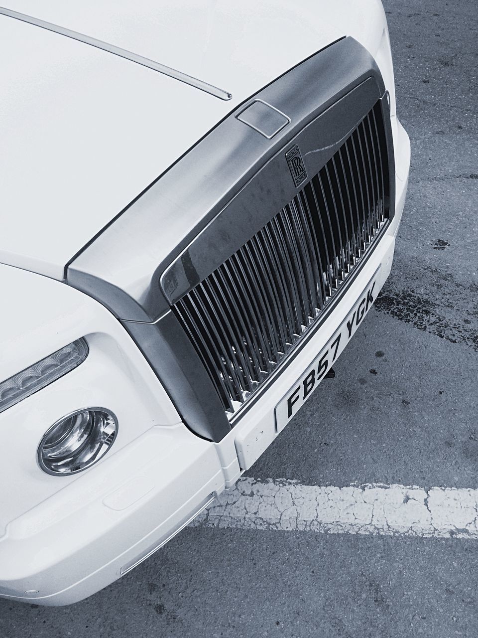 HIGH ANGLE VIEW OF VINTAGE CAR ON STREET