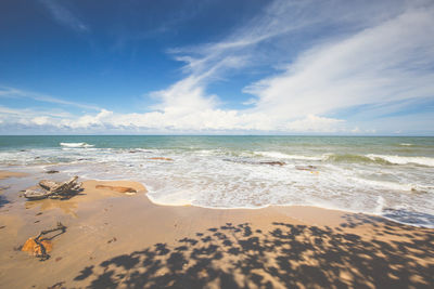 Scenic view of beach against sky