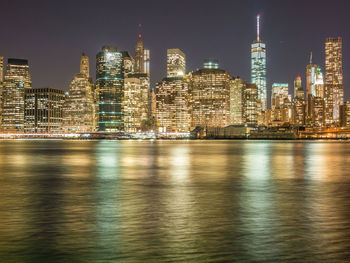 Illuminated buildings in city at night