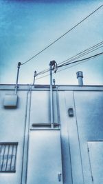 Low angle view of built structure against blue sky