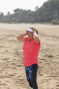 Woman standing on beach