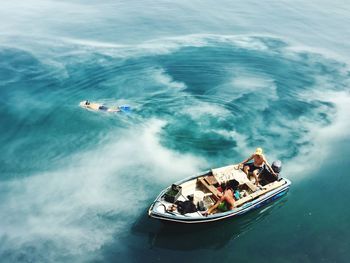 High angle view of people on sea