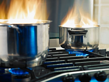 Close-up of cooking utensil on burner at kitchen