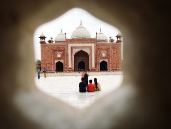 People in front of historical building