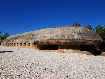 Built structure against clear blue sky