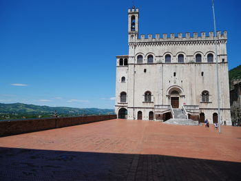 View of historical building against blue sky