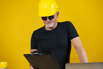Portrait of man using laptop