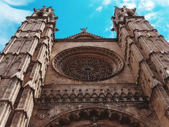 Low angle view of historical building against sky