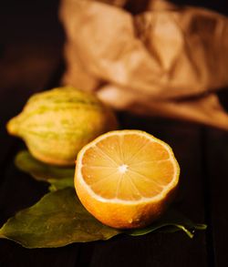 Close-up of lemons on leaves