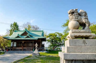 Statue against clear sky