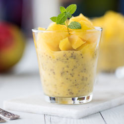 Close up of a refreshing mango chia pudding, ready for eating.