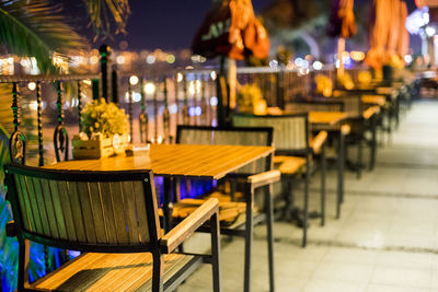 Empty chairs and tables at restaurant