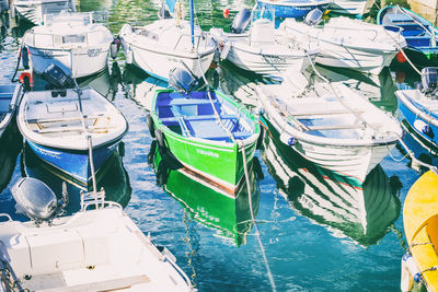 High angle view of boats moored at harbor