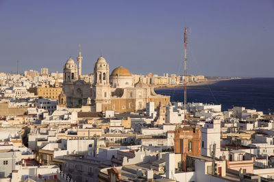 High angle view of buildings in city against sky