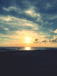 Scenic view of sea at sunset