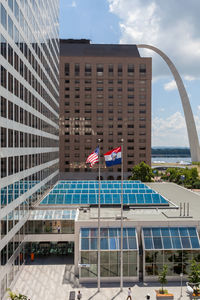 Low angle view of buildings in city against sky