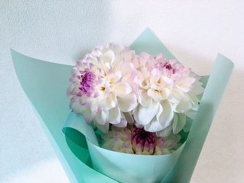 High angle view of pink flower on table