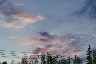 Low angle view of cloudy sky at sunset