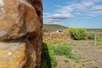 Scenic view of land against sky