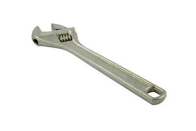 High angle view of wrench against white background