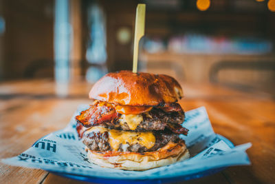 Close-up of burger in plate on table