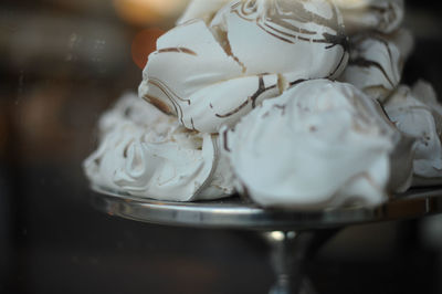 Close-up of dessert seen through glass at store