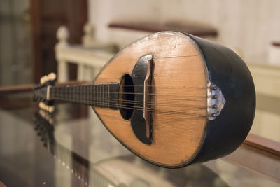 Close-up of mandolin on table