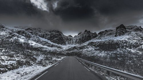 Panoramic view of snowcapped mountains against sky